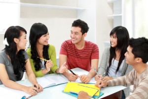 16165588 - group of students studying and discuss together in a classroom